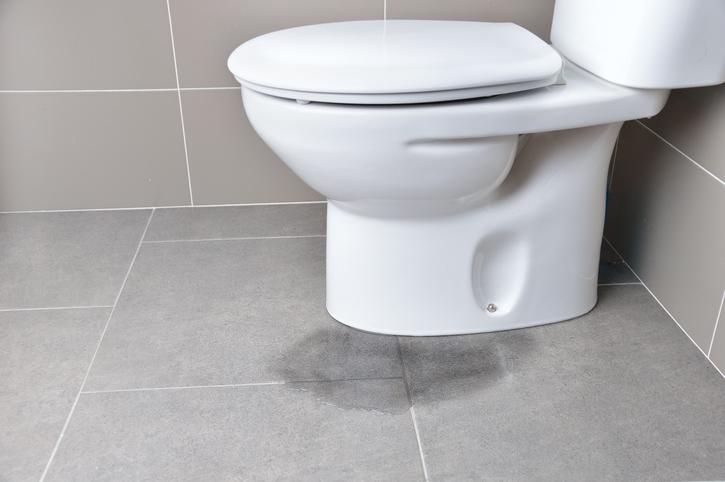 bathroom water under tiles