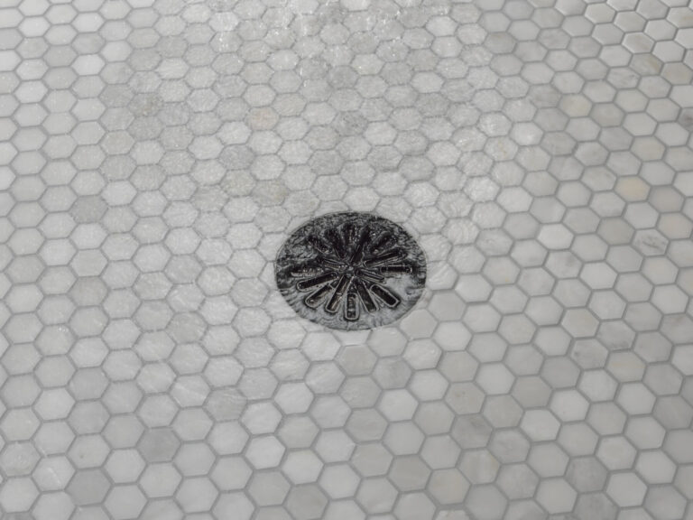 How to Remove Calcium Buildup in Shower Drain and Prevent Future Issues
