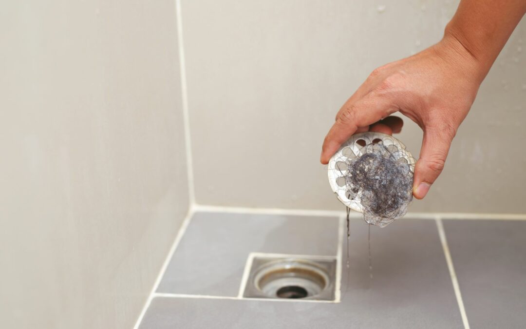 shower drain keeps clogging with hair