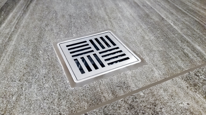 how to remove calcium buildup in shower drain