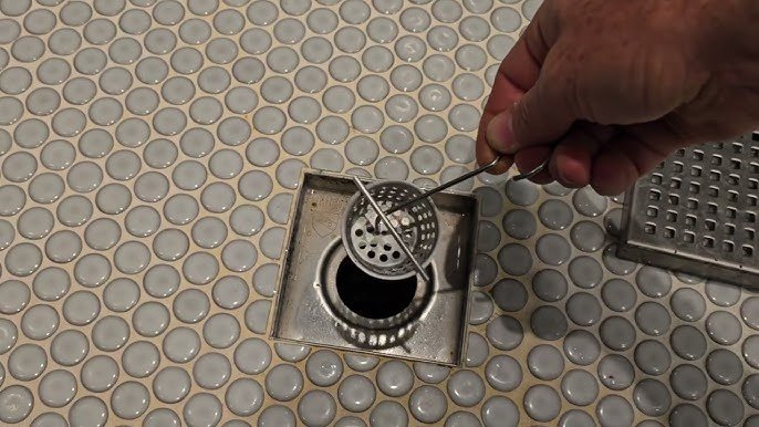 how to clean grout around shower drain