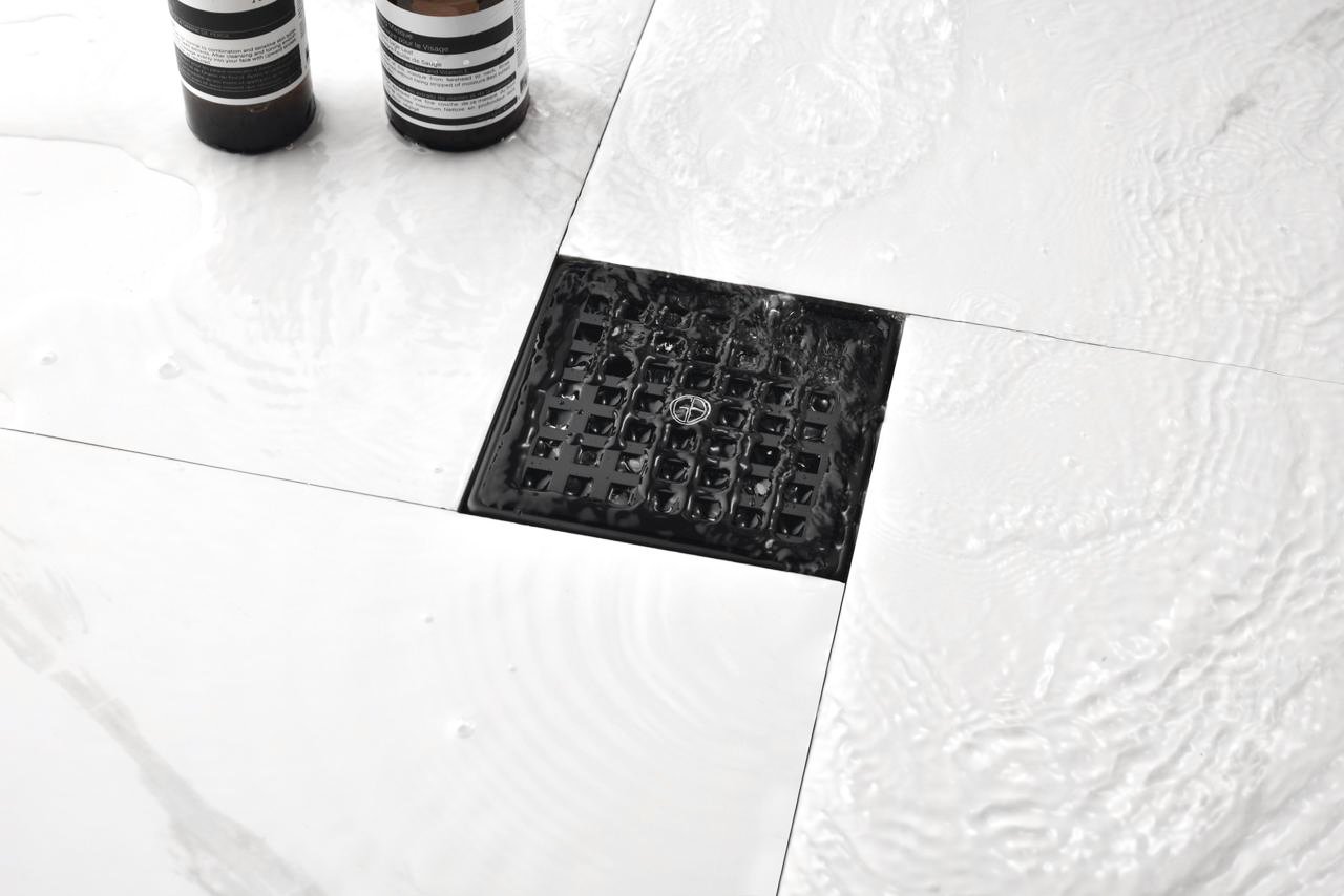 shower drain clogged with toothpaste buildup