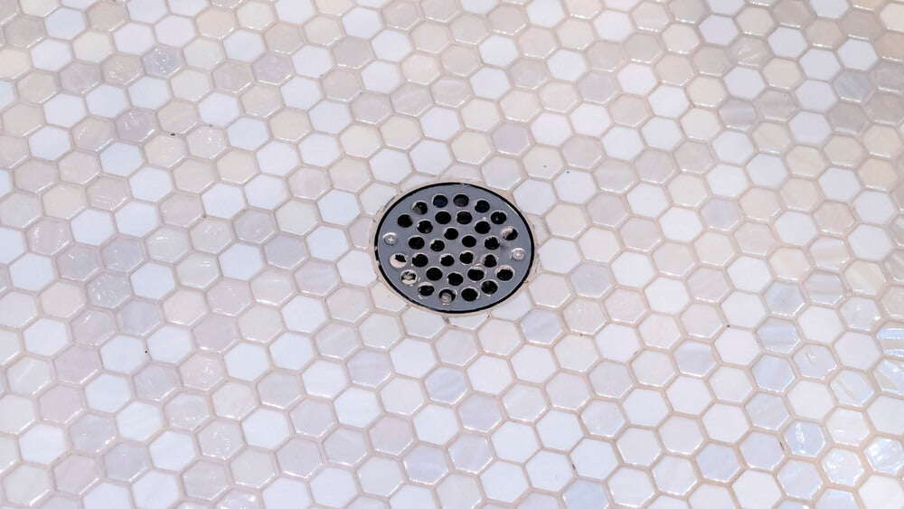 how to maintain shower drain